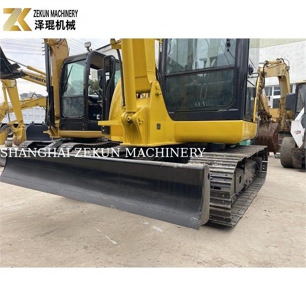 Komatsu PC56-7 Mini Excavator dengan berat operasi 5 ton dan mesin diesel tahan lama