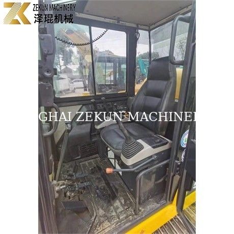 Komatsu PC56-7 Mini Excavator dengan berat operasi 5 ton dan mesin diesel tahan lama